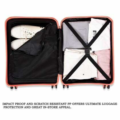 An open suitcase reveals a well-organized interior, featuring neatly packed clothing items secured with elastic cross straps. A pair of white sneakers is placed in a separate compartment, showcasing the suitcases efficient packing design.