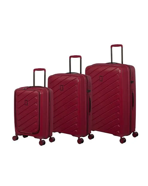 Three red hardside spinner suitcases of varying sizes are displayed. Each suitcase features a diagonal stripe design, four spinner wheels, and a retractable handle for easy maneuverability, ideal for travel.