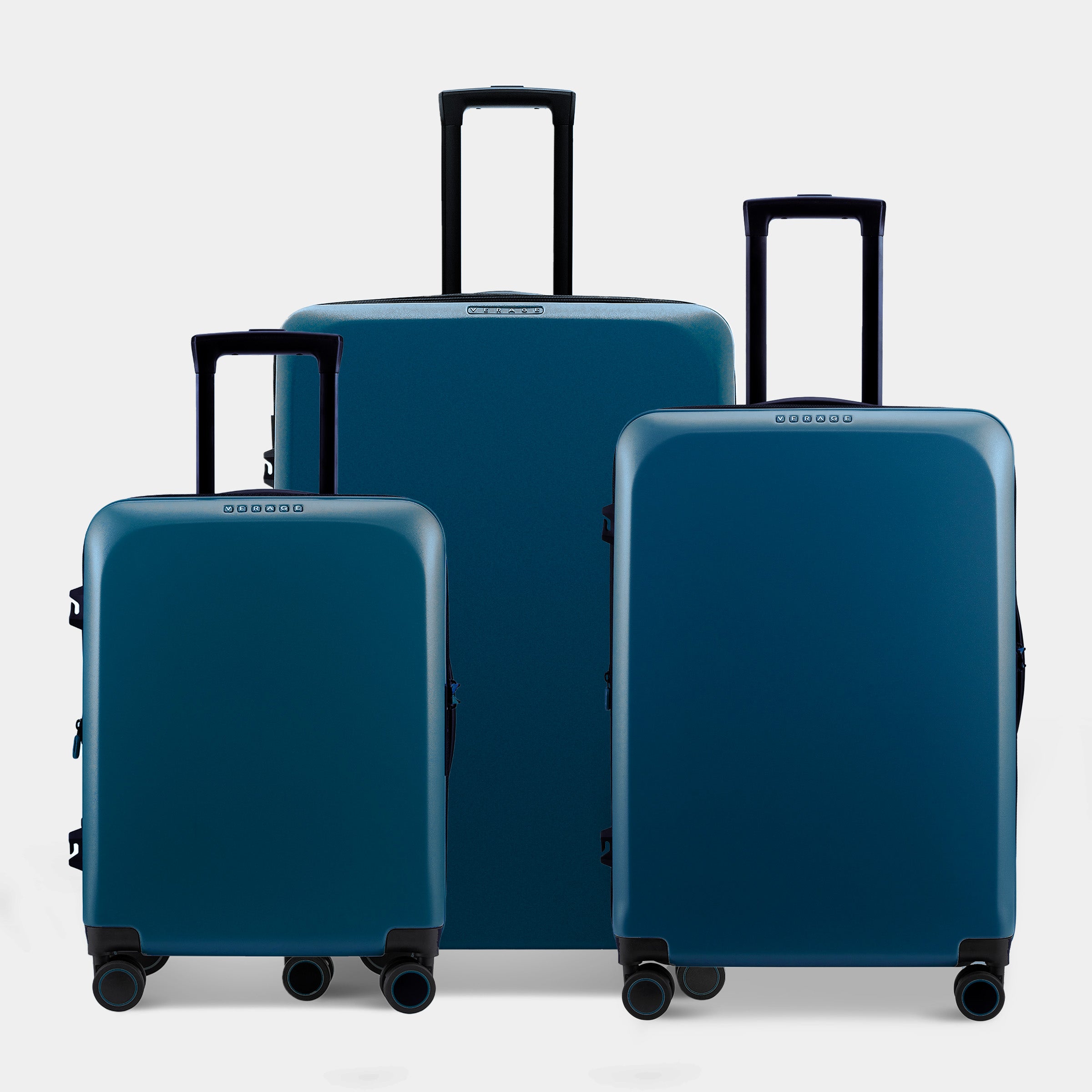 Three suitcases in varying sizes are displayed together, showcasing a sleek, matte teal finish. Each suitcase features a retractable handle and four double wheels for easy mobility, emphasizing a modern and stylish design.