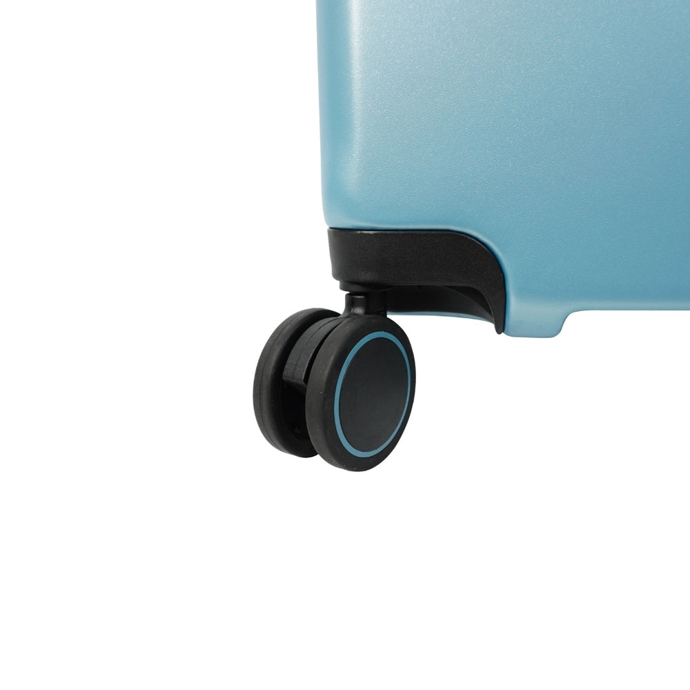 Close-up of a suitcase wheel featuring a durable design with a sleek black plastic casing and a blue accent. The wheel is crafted for smooth, silent movement, highlighting its functional and stylish attributes.