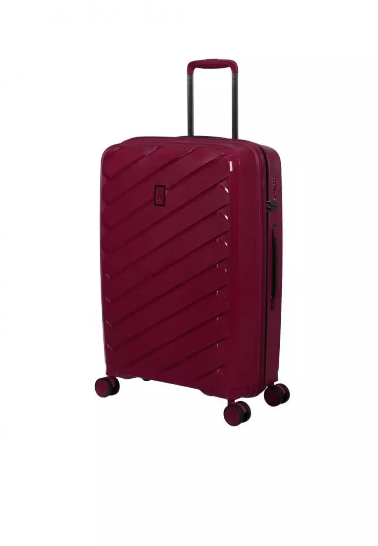 A stylish, deep red hardside suitcase with a chevron pattern is displayed. It features a retractable black handle, four spinner wheels for easy maneuverability, and a sleek design perfect for travel.